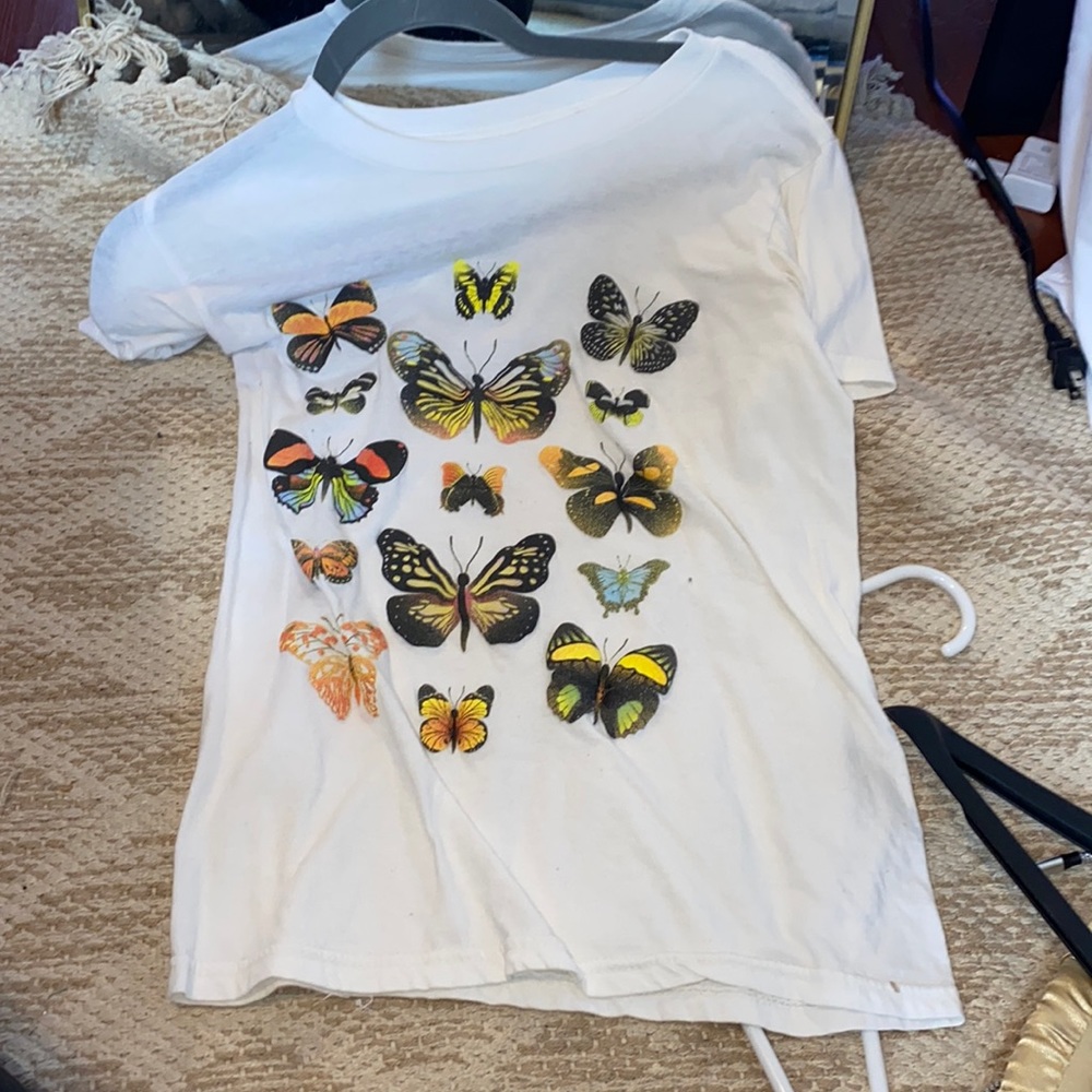 White graphic tee with butterflies